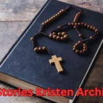 a rosary on a book